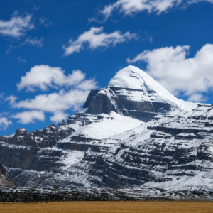 Mount Kailash snow-capped sacred peak reflected in Lake Mansarovar Tibet during the 2026 Horse Year Kailash Kora pilgrimage